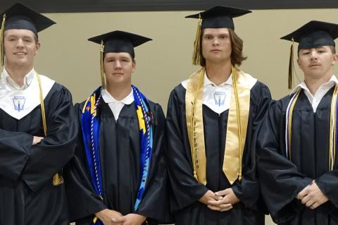 Easton Ledo, Lance Johnson, Jack Todd and Emmett Koonce before graduation last Friday.